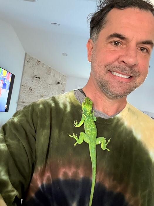 Aaron with a green lizard